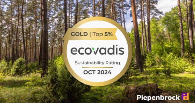 Goldsiegel von Ecovadis vor Wald-Hintergrund