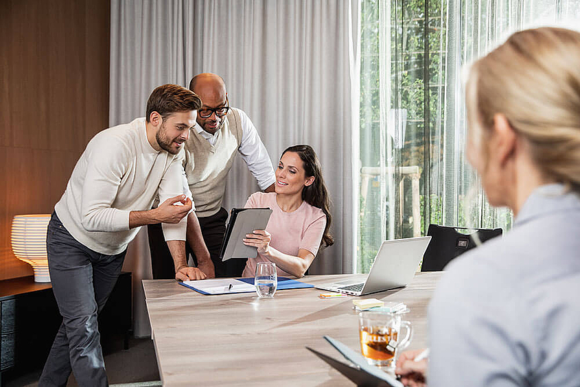 Teammeeting der Abteilung des Facility Management Consulting