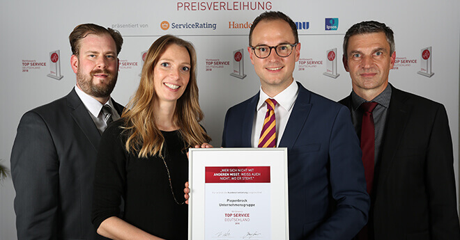 Entgegennahme der Auszeichnung "Top Service"